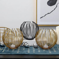 OrbGlo™ | Elevate your decor with the spherical metal candle holder! 0